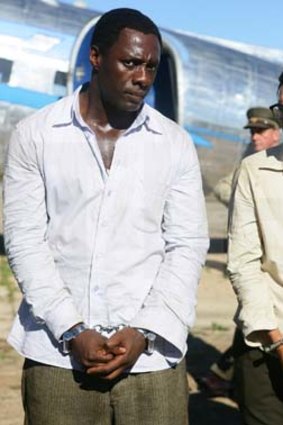 Idris Elba as Nelson Mandela in custody.