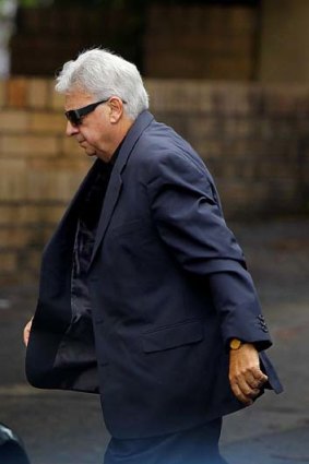 Ron Coles &#8230; arriving at Gosford police station.