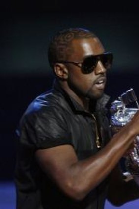 Kanye West takes the microphone from best female video winner Taylor Swift in 2009.
