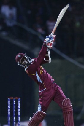 West Indies batsman Marlon Samuels hits out against New Zealand.