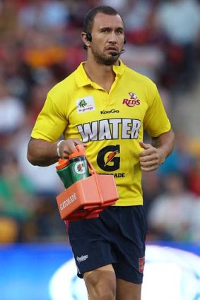 The water boy ... Quade Cooper acted as a water boy for the Reds on Saturday.