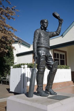 The statue of Sir Don Bradman by the artist Tanya Bartlett standing in front of the Bradman museum in Bowral.