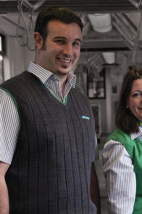 Staff members in the new uniforms.