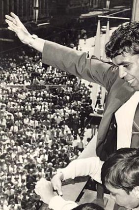 Rose waves from the balcony of Melbourne Town Hall to a huge crowd celebrating his world championship in 1968.
