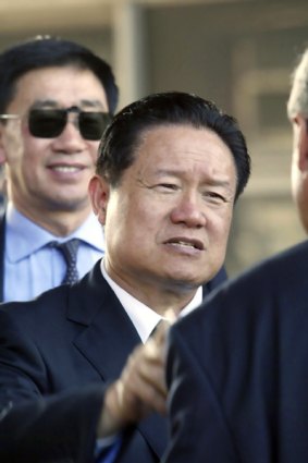 China's security and intelligence chief, Zhou Yongkang, on a 2006 visit to France.