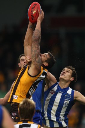 The unstoppable Lance Franklin takes a mark.