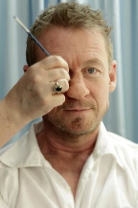 Step Two: The makeup artist applies the finishing touches to blend in Richard Roxburgh's new nose.