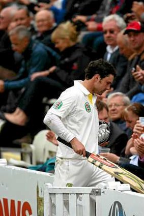 Ed Cowan of Australia leaves the ground after being run out against Worcestershire.