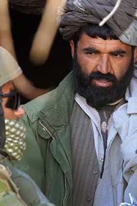 Inspection ... conflict flared between a local Pashtun farmer and an ethnic Tajik sergeant major from the Afghan brigade.