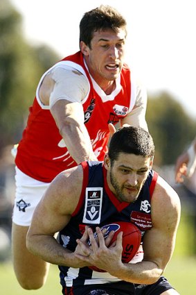 Brendan Fevola takes a mark for the Casey Scorpions.