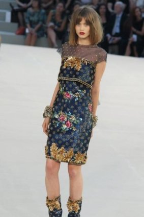 Flower power: Kershaw on the runway for Chanel in Paris in 2010.