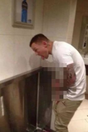 The infamous image that caused a social media storm. Todd Carney was snapped at a urinal creating a 'fountain'.