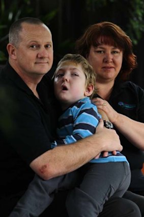 Brain damaged ... Michael and Jo-ann Morris with Samuel, who fell into a pool.