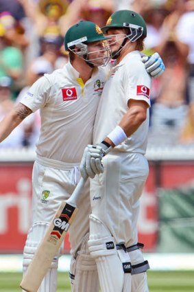 Close, but not close. Michael Clarke (L) celebrates with teammate Shane Watson (R) after scoring his century against Sri Lanka at the Melbourne Cricket Ground. A major rift in the team between captain Clarke and former vice-captain Shane Watson has been alleged by sacked coach Mickey Arthur.