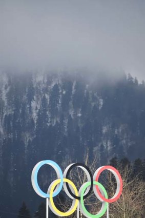 Portent of things to come? Fog descends over the Olympic rings at Sochi.