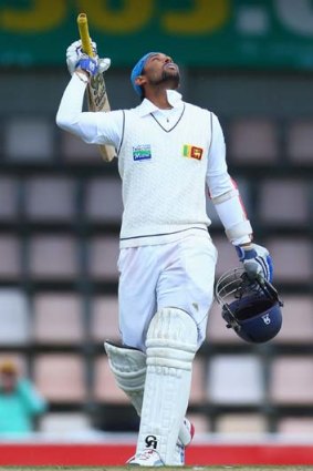 Sri Lanka's Tillakaratne Dilshan after reaching three figures.