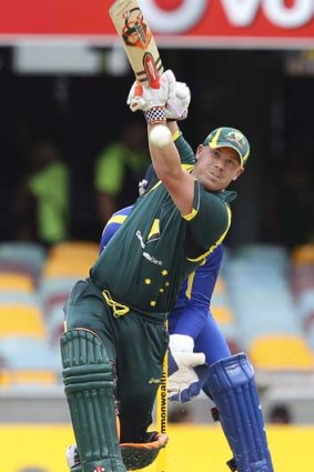 Power play: David Warner on his way to 163 off 157 balls against Sri Lanka.