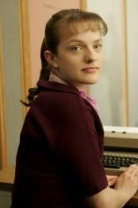 Elisabeth Moss as Peggy Olsen. 