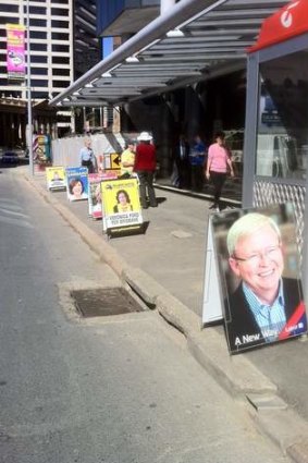 Candidates' signs outside the Electoral Commission's offices in Queen Street.