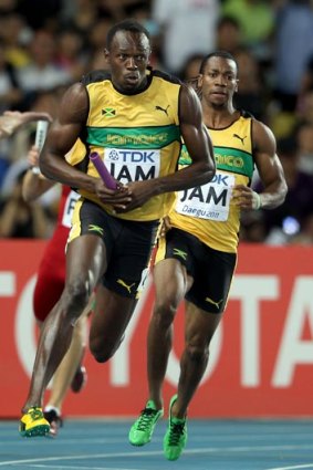 At the 2011 world championships, it was Yohan Blake, right, passing the baton to Usain Bolt when Jamaica set a new world record to win gold in the men's 4x100m relay. In London, will the roles be reversed?