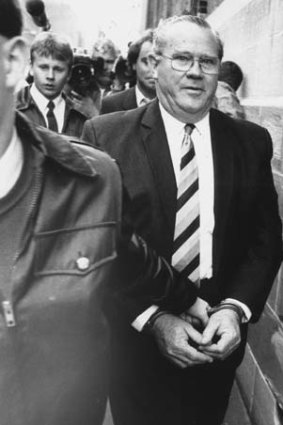 Jackson being led into court in handcuffs in 1987.