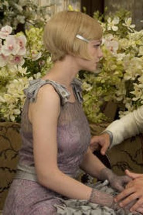 Carey Mulligan as Daisy Buchanan and Leonardo DiCaprio as Jay Gatsby in <i>The Great Gatsby</i>.
