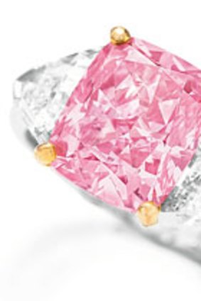 The diamond has a vivid pink hue and is considered near perfect, but not quite flawless.