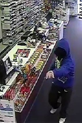 Police are looking for this man, wearing a hooded jumper.