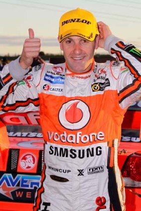 Jamie Whincup celebrates after his win.