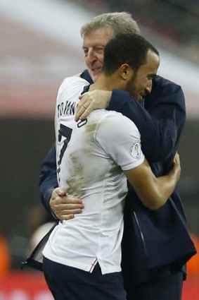 Friendly embrace: England's manager Roy Hodgson and young star Andros Townsend.