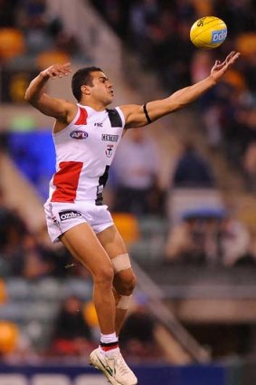 Ahmed Saad marks during the game against the Brisbane Lions.