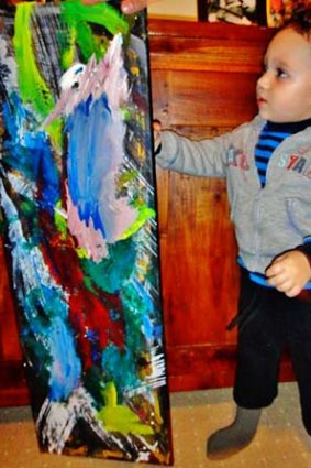 Colouring his world: Two-year-old Vinnie Macris at work.