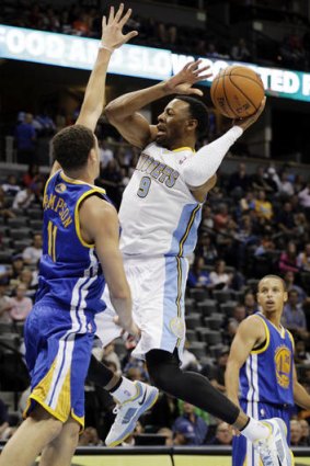 Denver Nuggets recruit Andre Iguodala in action against Golden State Warriors during the NBA pre-season.