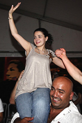 In her father's footsteps: Nayla Tueni celebrates her win with supporters in Beirut.