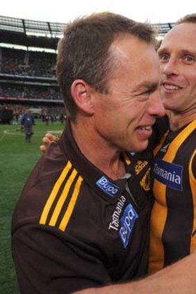 Brad Sewell with coach Alastair Clarkson following the Hawks' grand final victory.