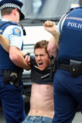 Off-court drama...Auckland police arrest a man who was protesting against Israeli Shahar Peer at the ASB classic.