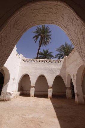 The arch that leads into a courtyard inside the enclosed old town, a designated UNESCO World Heritage site, in the Libyan desert oasis town of Ghadames.