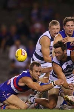 Jimmy Bartel competes for the ball.