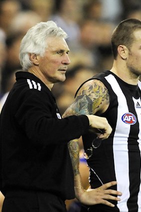 Collingwood coach Mick Malthouse with Dane Swan.