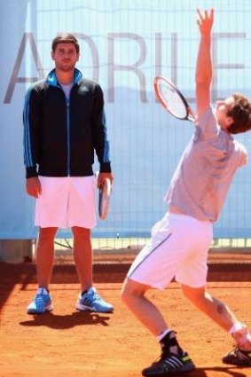 On the outer? Dani Vallverdu watches on as Andy Murray  practices during the Madrid Open in April.