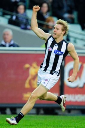 Standing up: Ben Sinclair kicked three goals for the Pies yesterday.