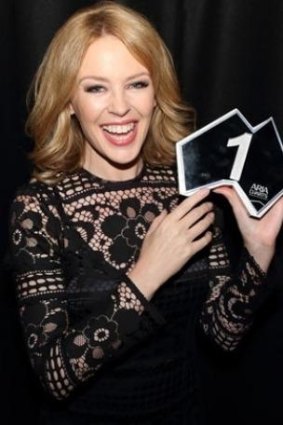 Kylie Minogue receiving her ARIA plaque for topping the ARIA album chart this year.