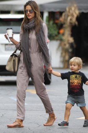 Alessandra Ambrosio  wears a stylish jumpsuit to go shopping with her son Noah.