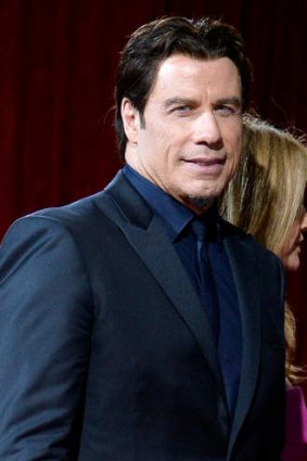 Travoltify your name ... John Travolta bumbles Idina Menzel's name at the Oscars.