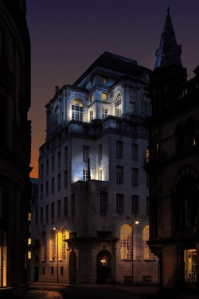 Subtle lighting adds an eerie night-time atmosphere to the hotel. 
