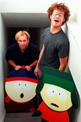 Parker (left) and Stone with cut-out <I>South Park</i> characters Stan Marsh (at left) and Kyle Broflovski.