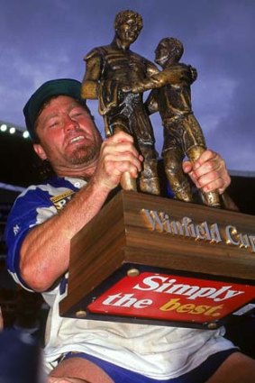 Wealth of experience ... Terry Lamb holds aloft the premiership trophy in 1995.