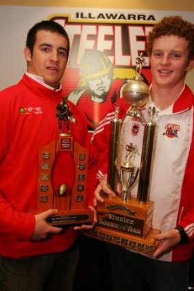 Alex McKinnon (right) holds an under-16 player of the year award in 2007.