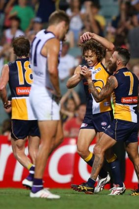 Chris Masten (right) of the Eagles celebrates with Matt Priddis after the win over the Dockers in the pre-season competition.