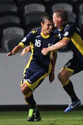 Trent Sainsbury, seen here with Daniel McBreen, scored the winner when the Mariners had a 2-1 home win against Guizhou last week.
